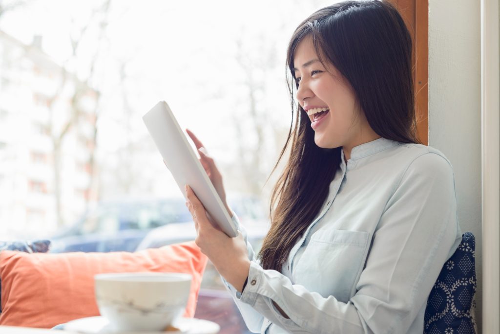 Woman using digital tablet